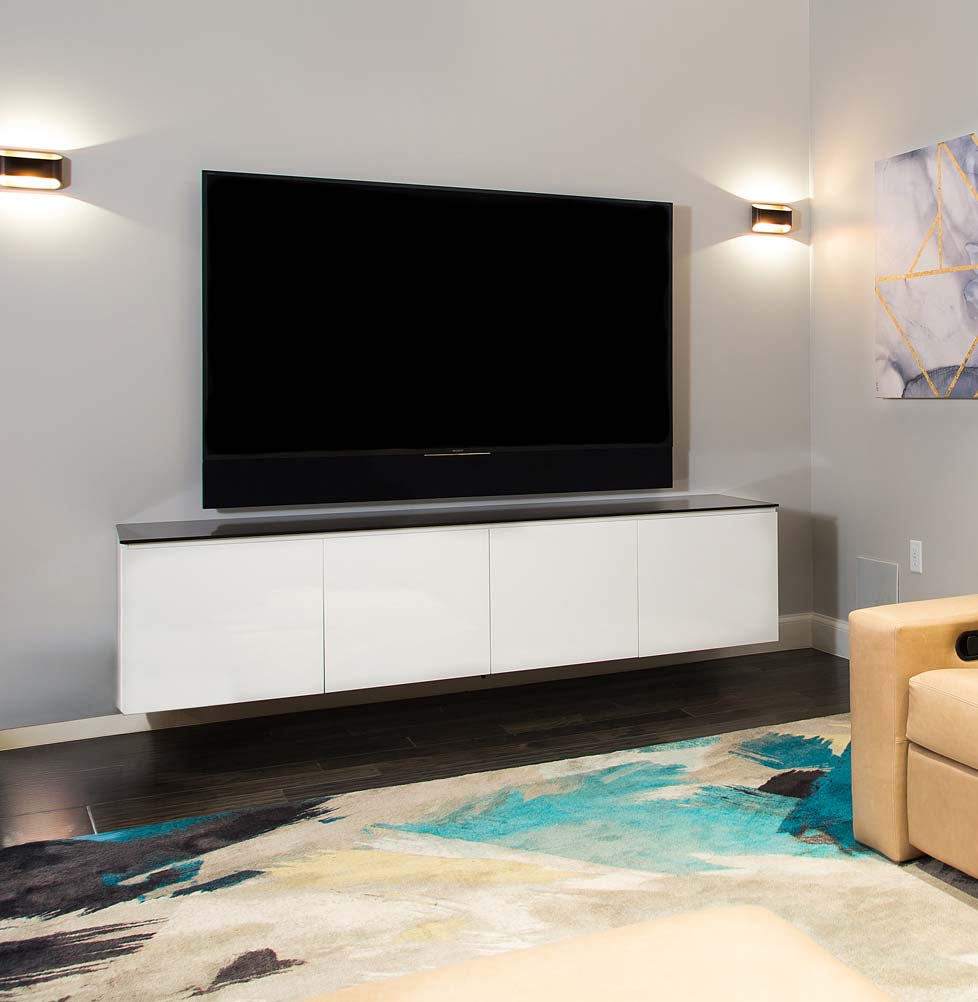 Barcelona cabinet with several custom features such as a refrigerator, trash bins and adjustable shelves